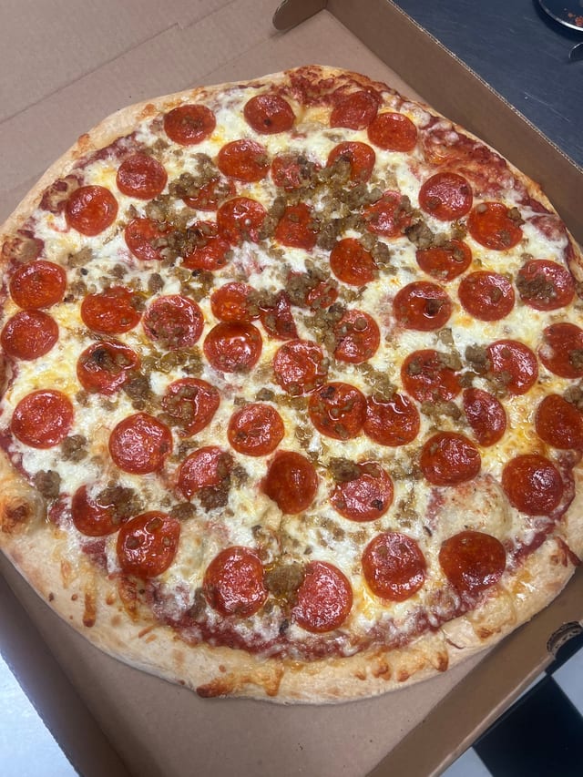Large 1 Topping Pizza, 20 Wings, & 2 Liter Soda.