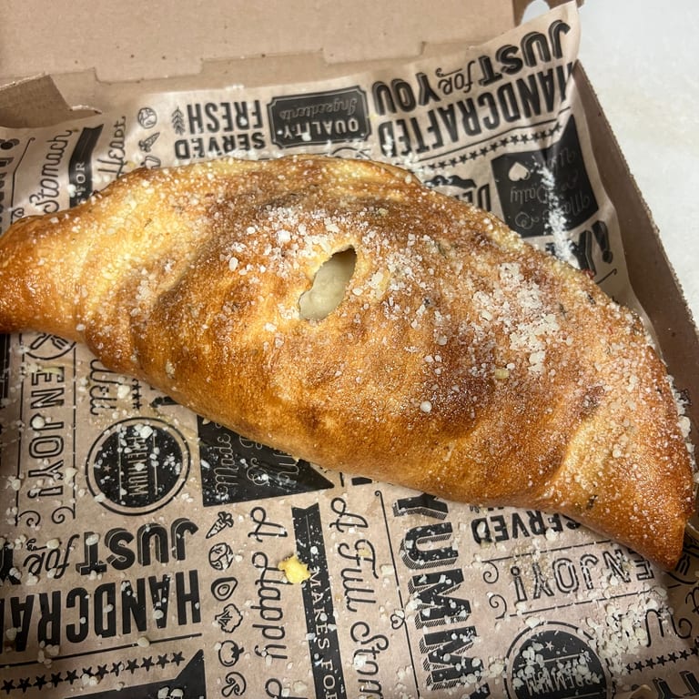 Delicious Calzones: A Must-Try at Our Restaurant